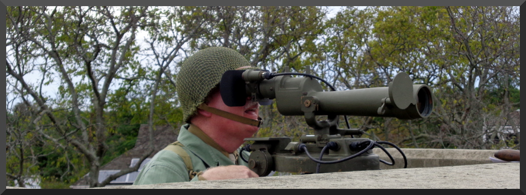 Modern photo of an AGFA member looking through an M1910A1 Azimuth Instrument